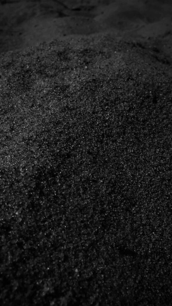 close up sand black wallpaper